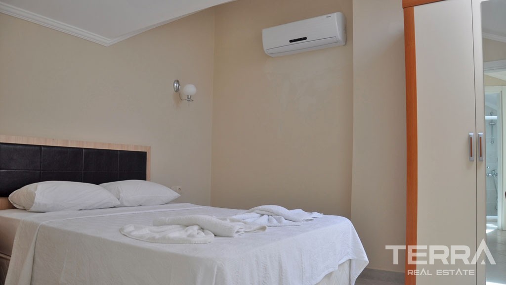 Möblierte Wohnung in Strandgrundstück in İn Çalış Fethiye - 23048