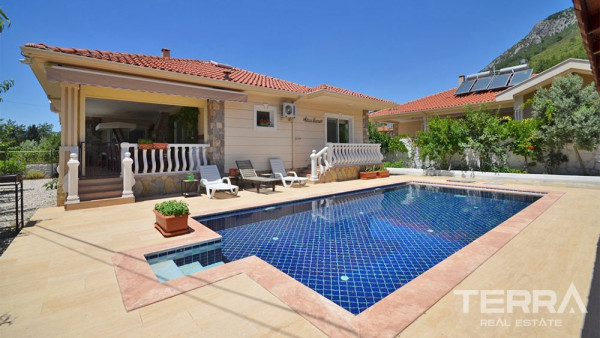 Bungalow med have til salg i Üzümlü, Fethiye, Tyrkiet