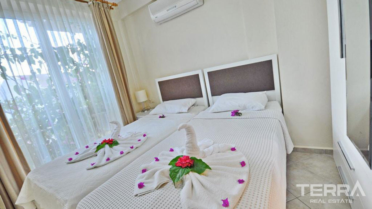 Resale Seafront Apartment in Fethiye, Çalış with Shared Swimming Pool - 57553