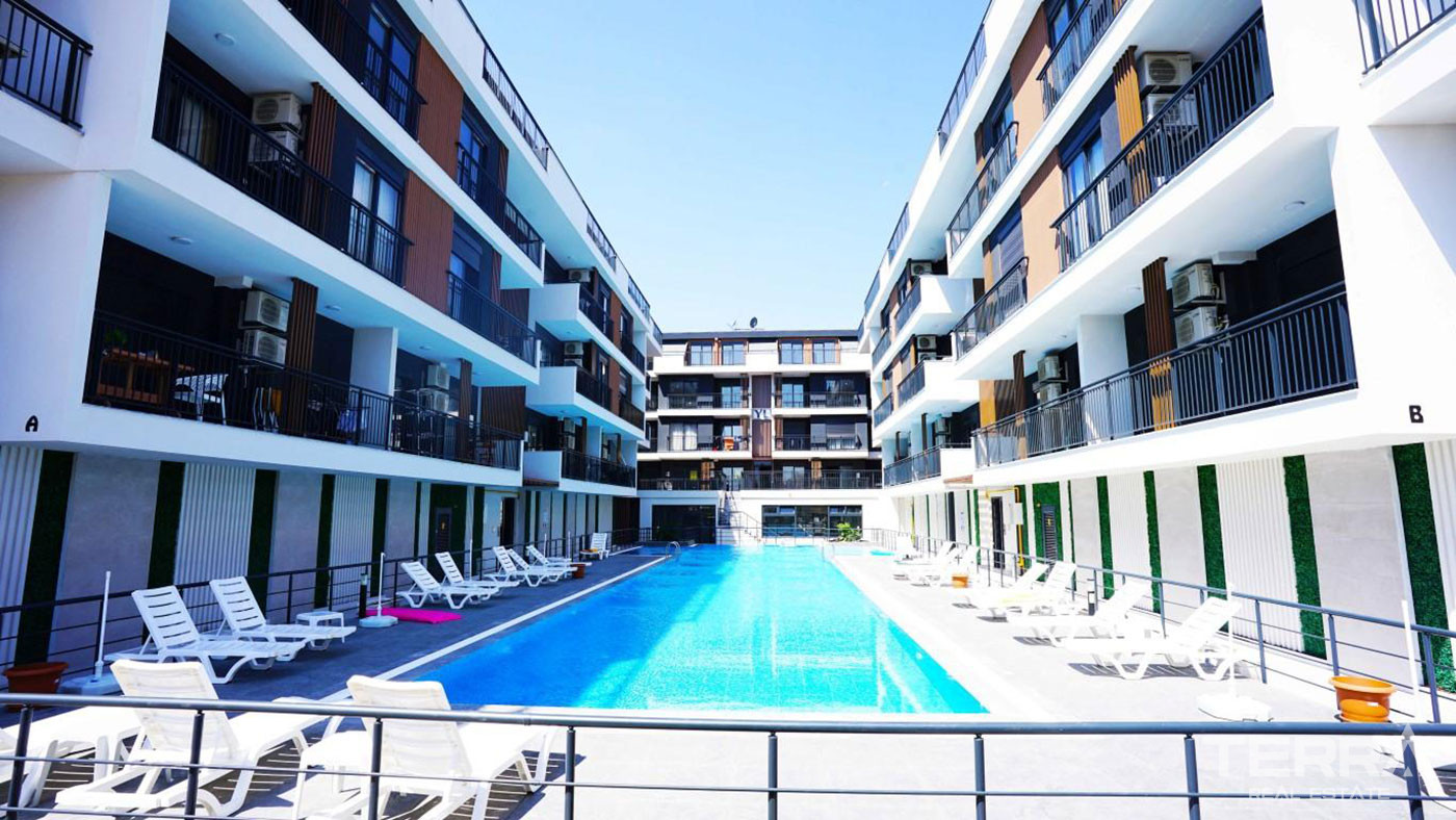 Mieszkania w Antalyi w dogodnej lokalizacji w Konyaaltı z krytym basenem